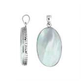 Sterling silver oval pendant with mother of pearl and hammered silver frame handcrafted in Bali